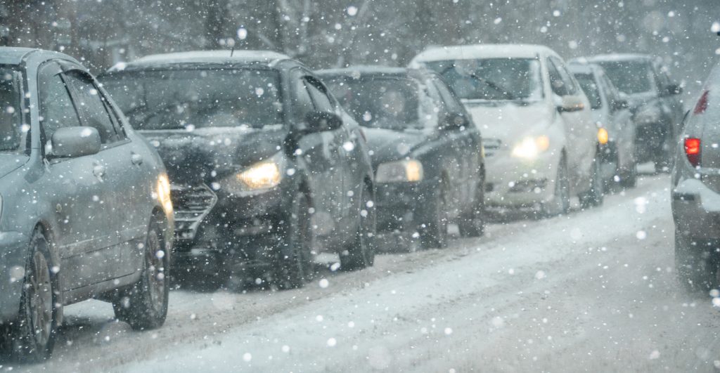 Cars stuck in traffic during a snow event.