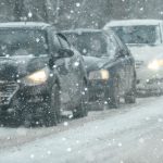Cars stuck in traffic during a snow event.
